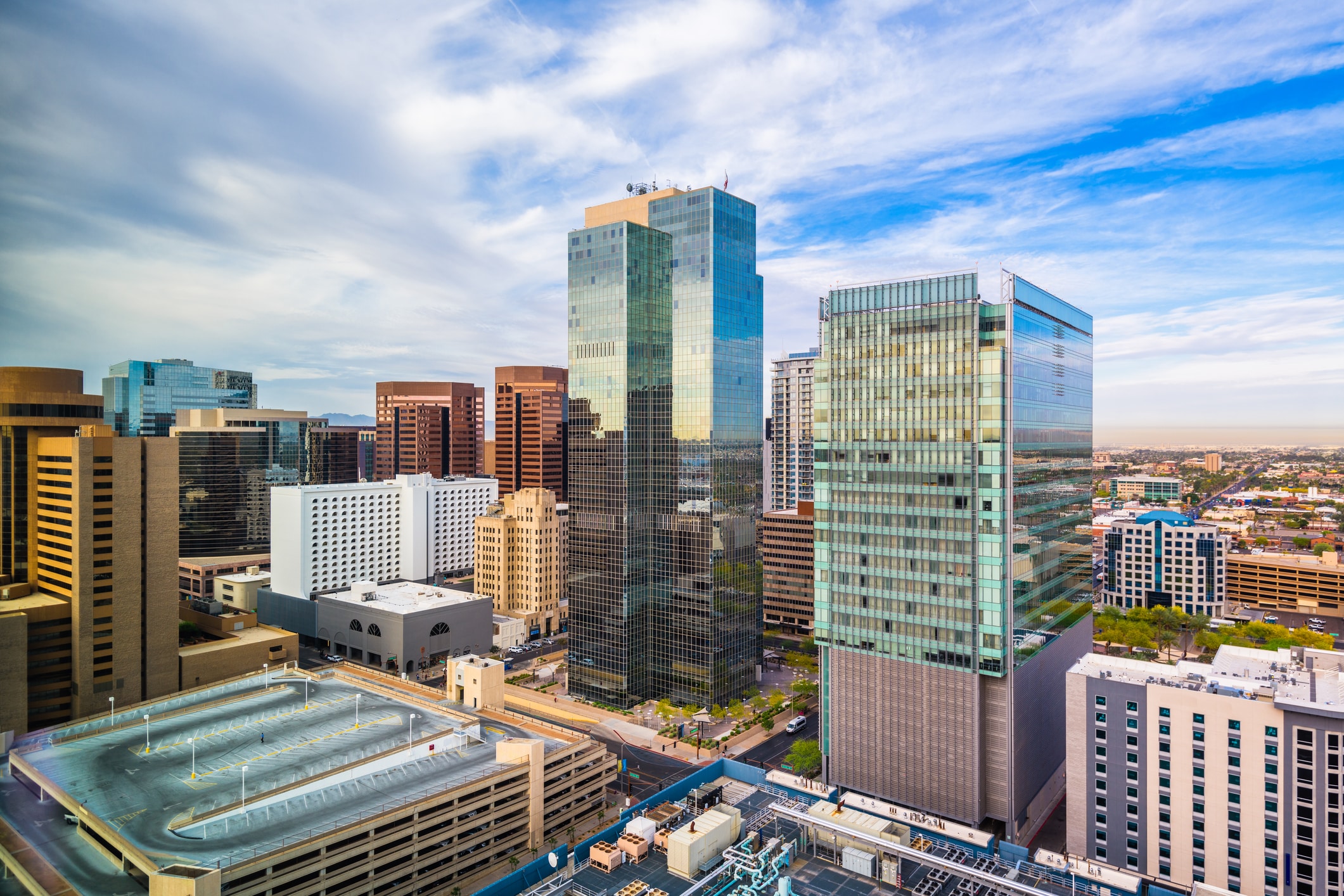 Downtown Phoenix skyline under overcast skies—a vibrant hub of growth and opportunity for those moving to Phoenix