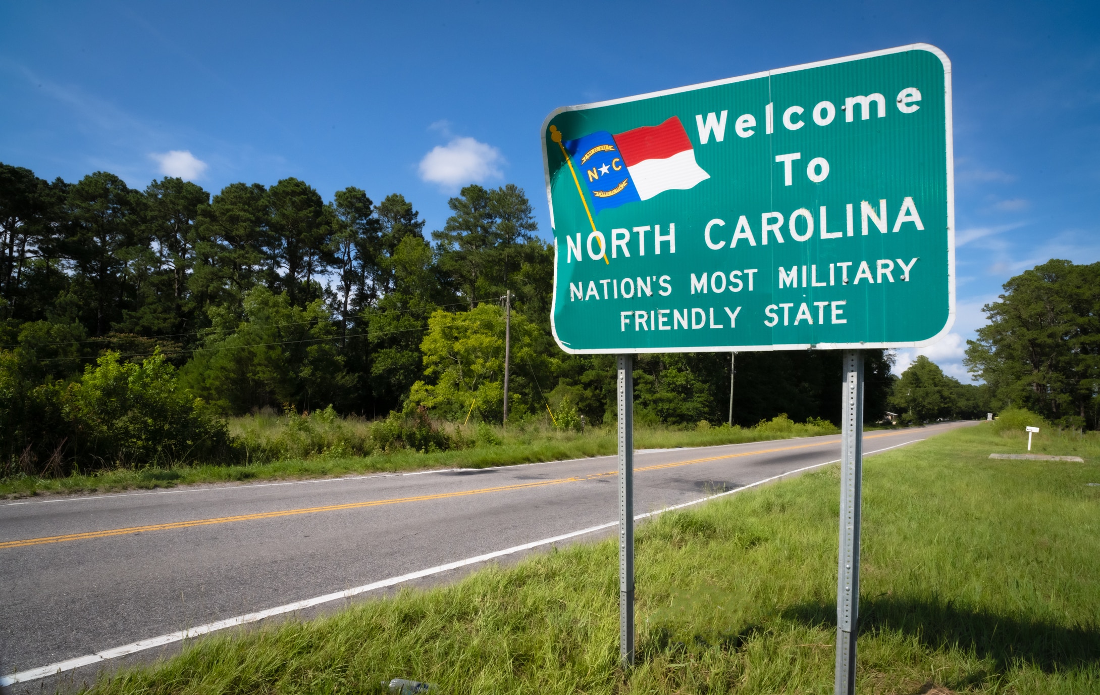 A sign that reads “Welcome to North Carolina" sign, celebrating the state as the nation's most military-friendly state