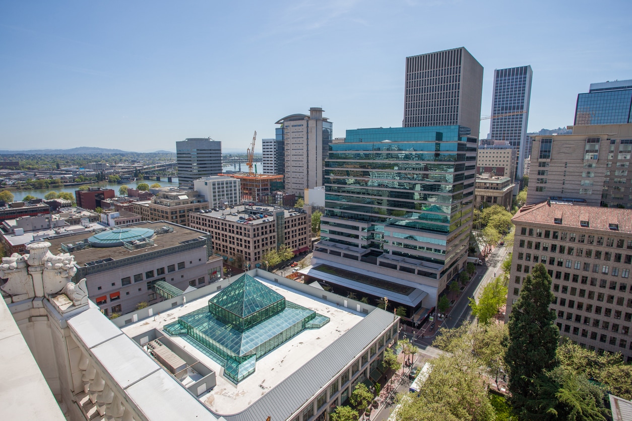 Aerial view of modern office buildings with an atrium in Oregon featuring glass architecture