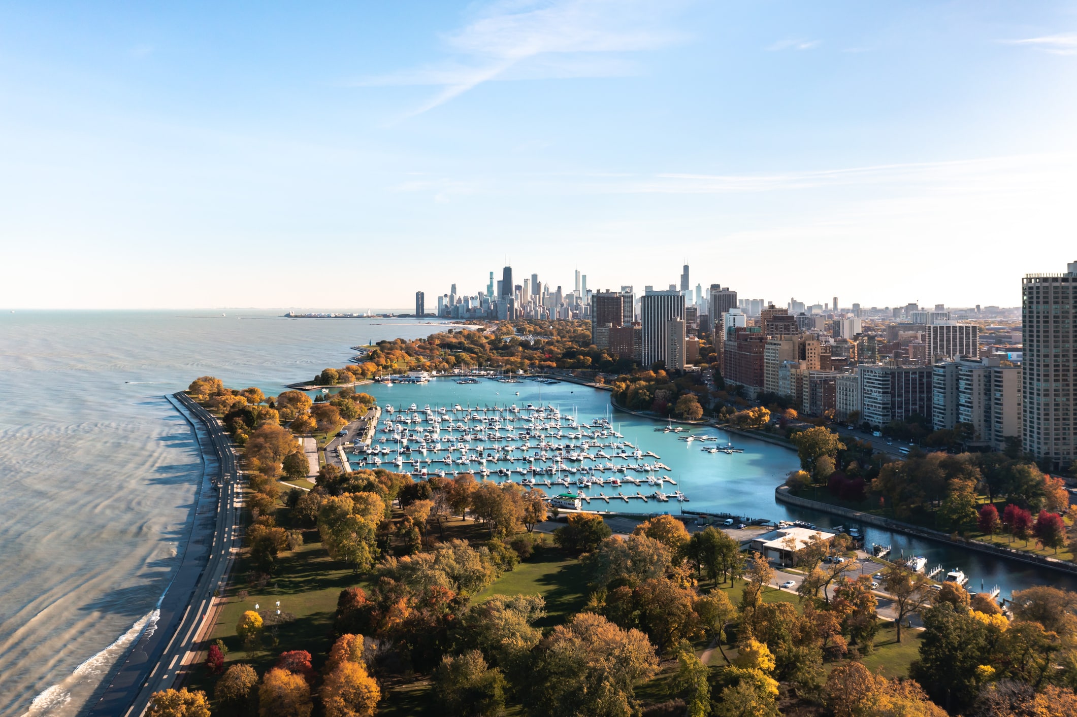 Aerial view of Lakeview, one of Chicago's best neighborhoods, featuring a marina with boats and the city skyline