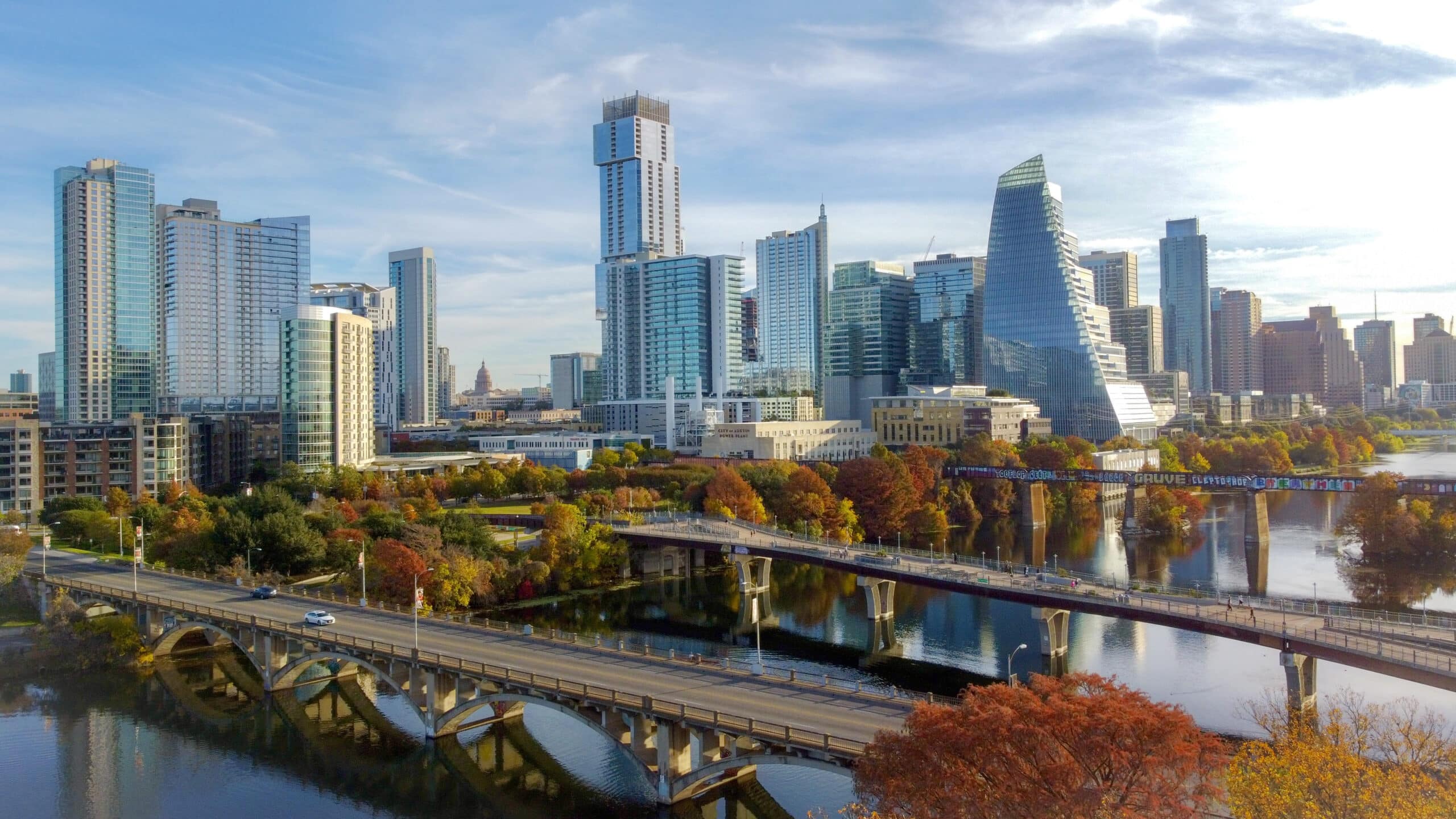 Stunning skyline view of Downtown Austin in the autumn featuring Lady Bird Lake