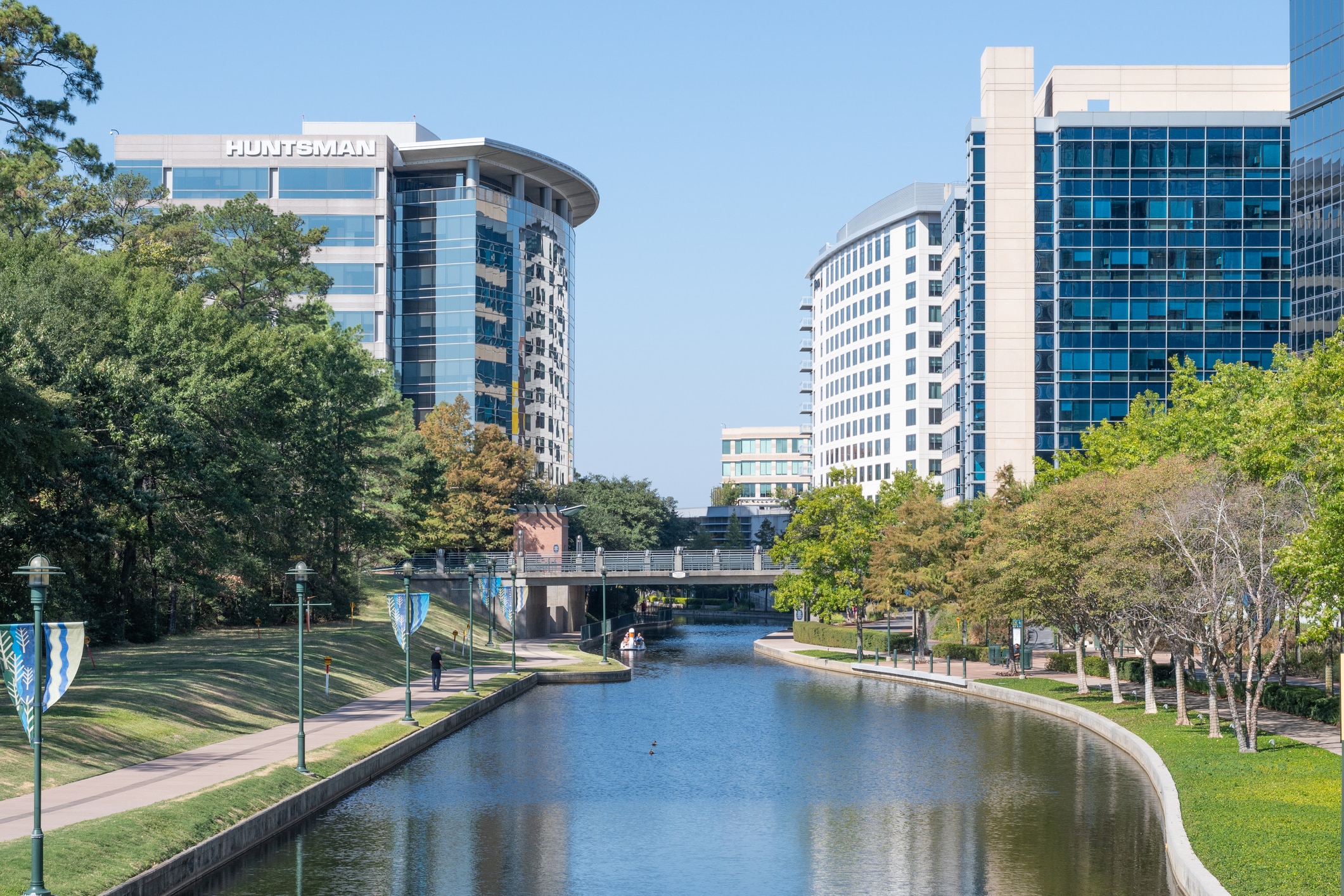 The Woodlands, featuring a scenic bridge and river, is one of the top places to live in Houston, TX