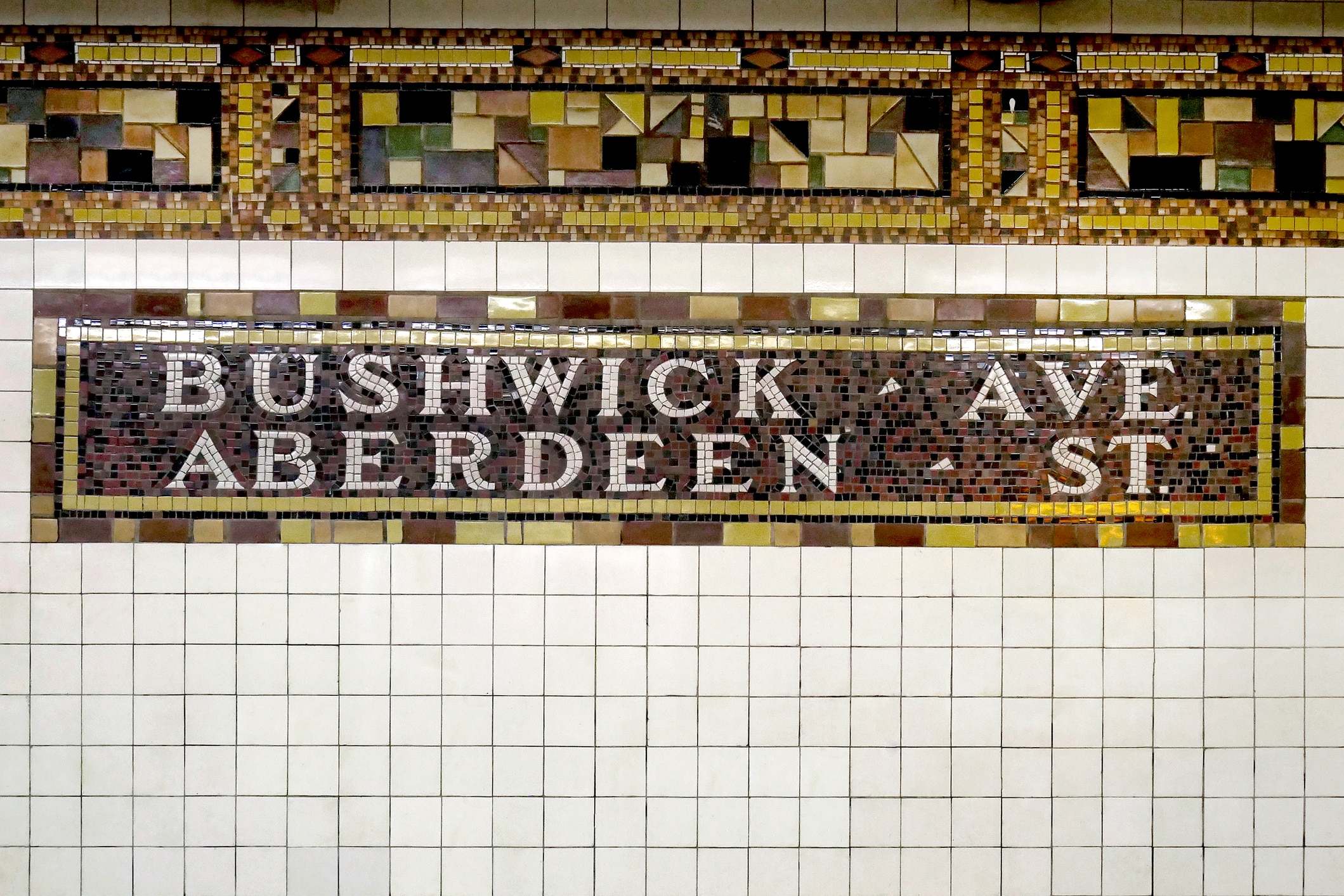 Mosaic art in the subway reads “Bushwick, Brooklyn,” one of the best neighborhoods in Brooklyn