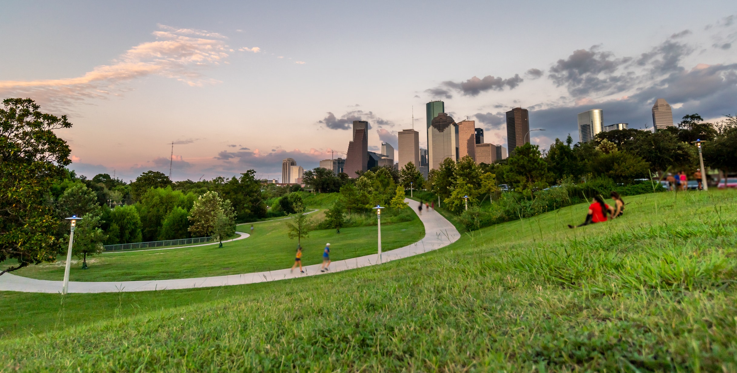 Joggers and visitors enjoy Eleanor Tinsley Park, a popular spot for those moving to Houston