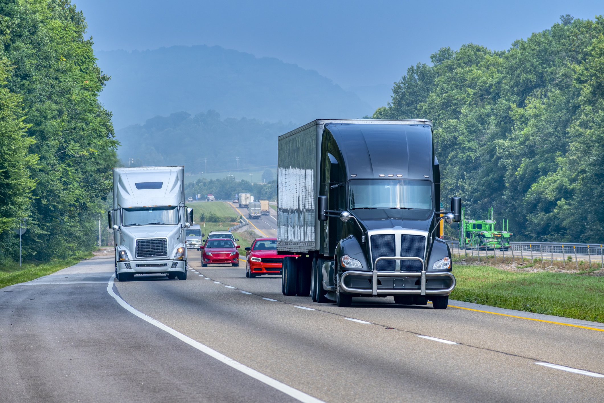 Moving trucks on their way to Tennessee, a popular destination for many people who are relocating