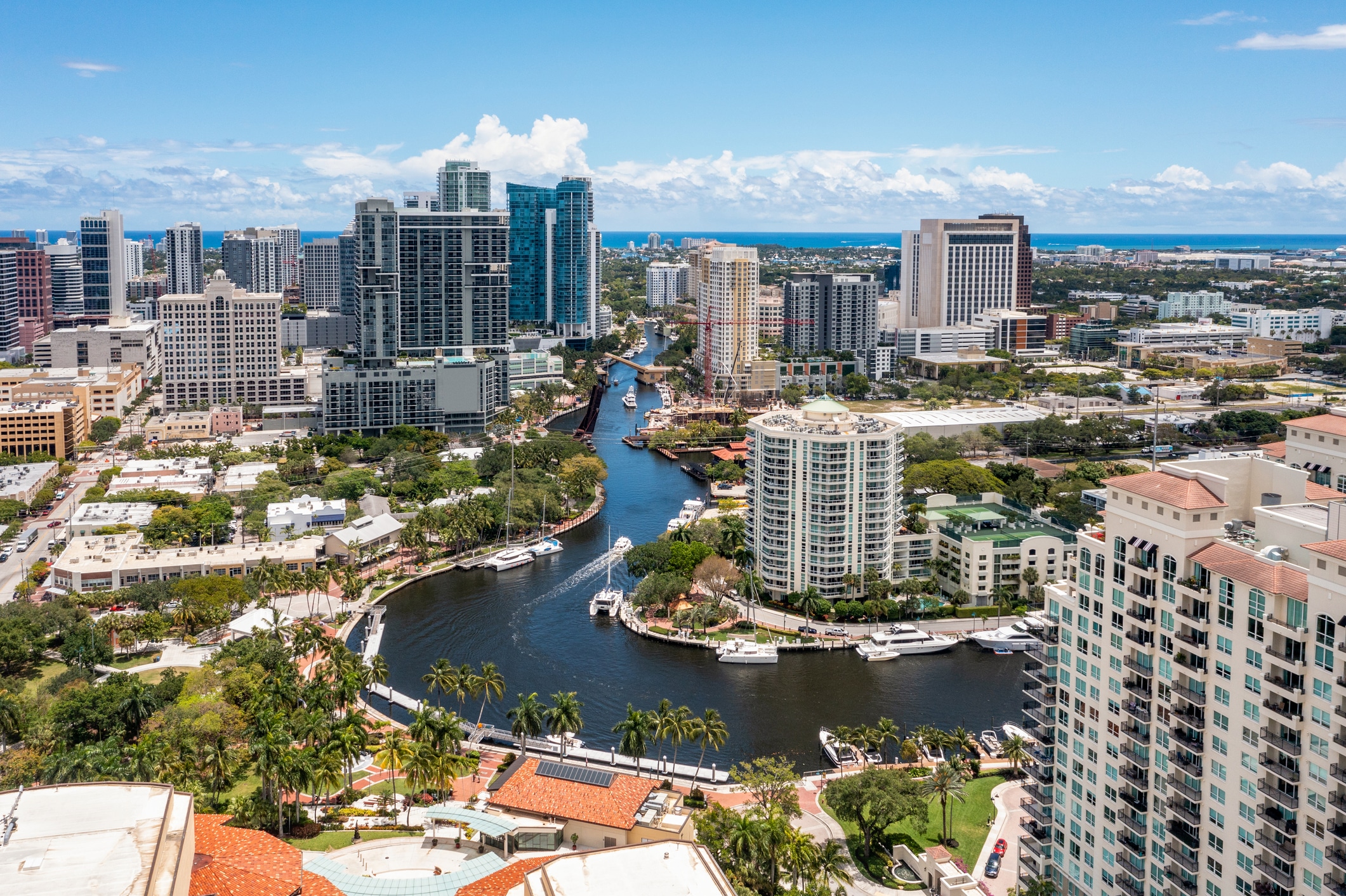 High-rise buildings along the New River in Fort Lauderdale, a stunning view for those moving to Fort Lauderdale