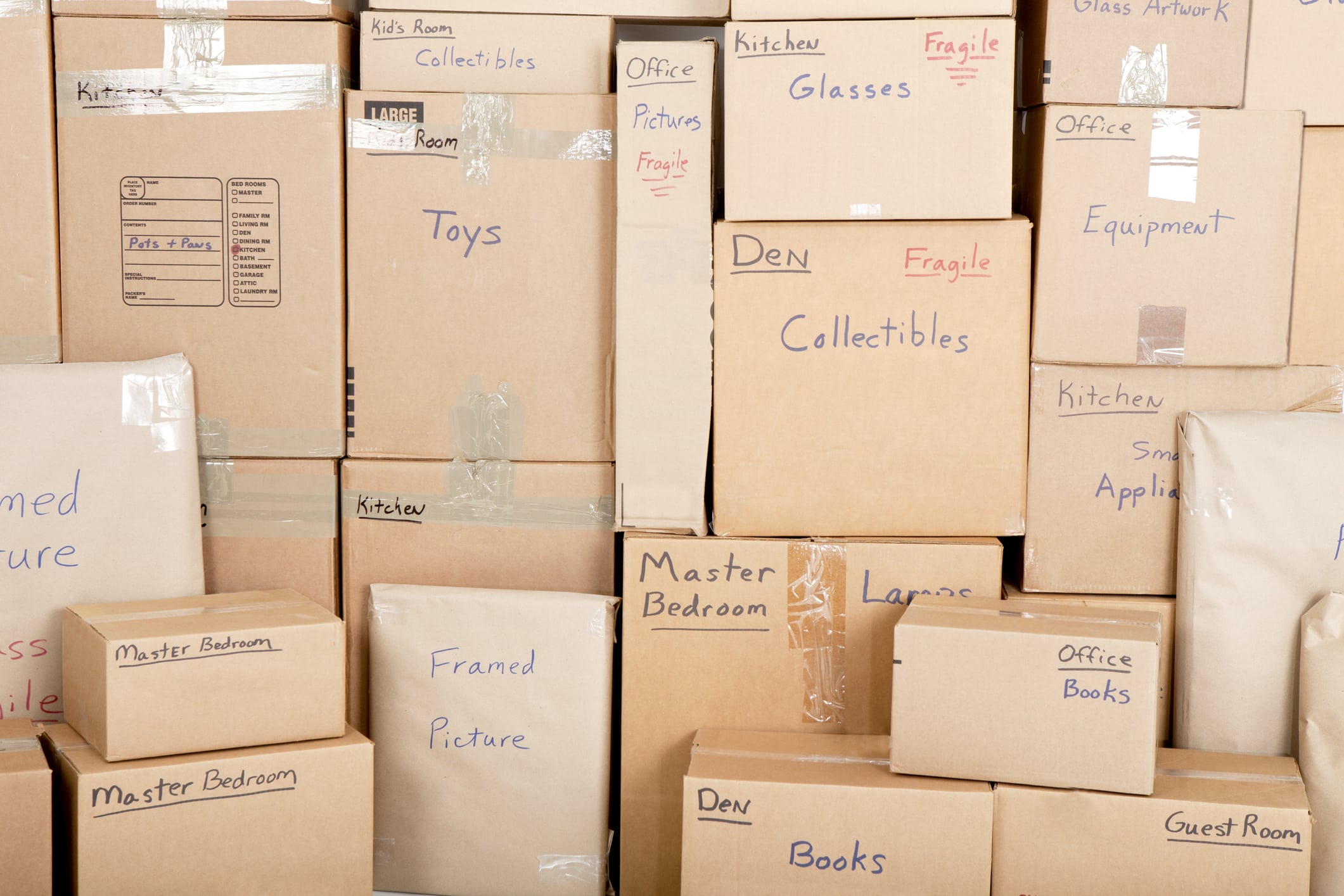 A wall of variously sized, clearly labeled boxes