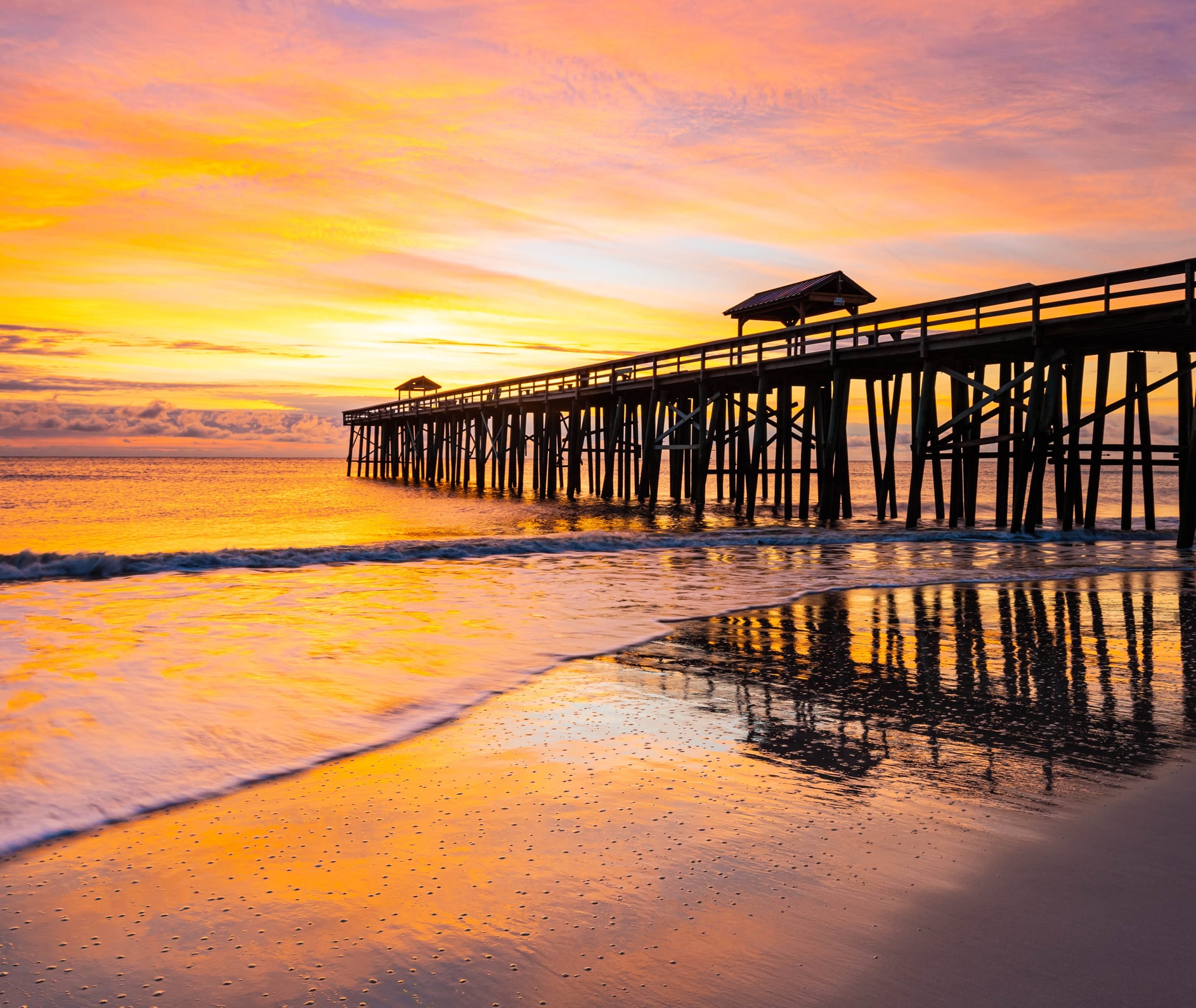 The wooden pier on Fernandina Beach in Amelia Island, Florida, a scenic spot to watch the sunrise