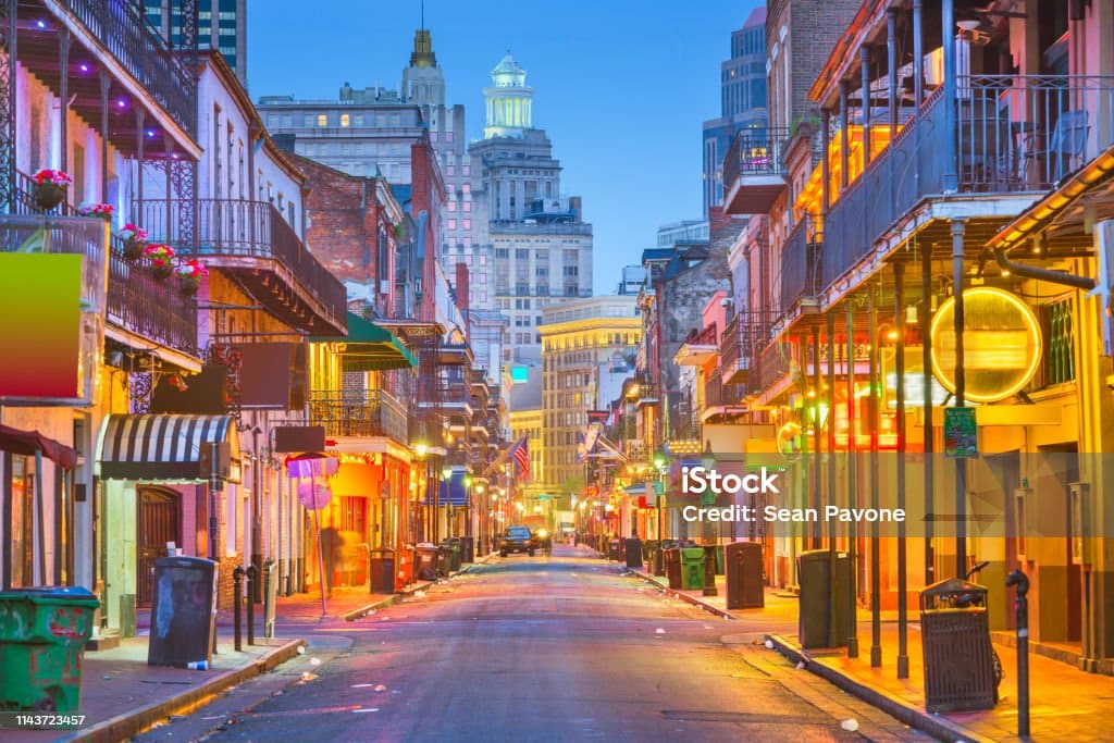 istockphoto-1143723457-1024x1024 Bourbon St, New Orleans, Louisiana, USA cityscape of bars and retaurants at twilight.
