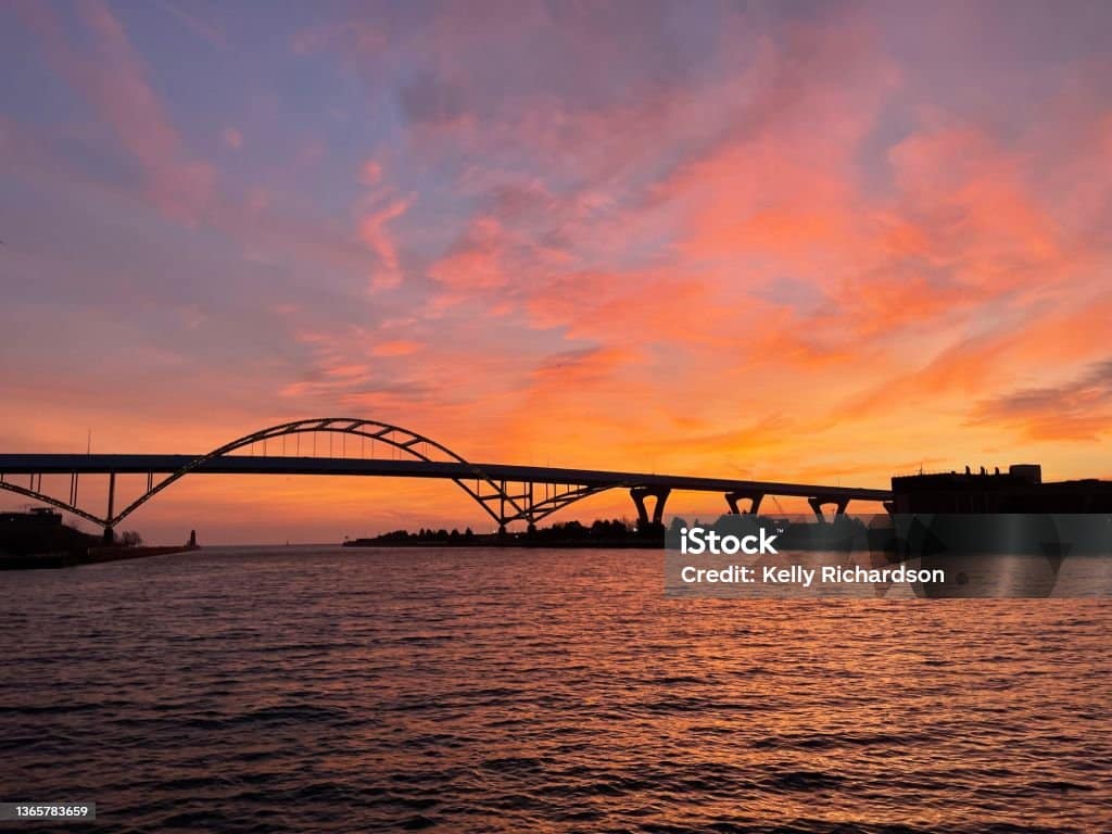 Silhouette of bridge over Milwaukee river on Lake Michigan Silhouette of bridge over Milwaukee river on Lake Michigan