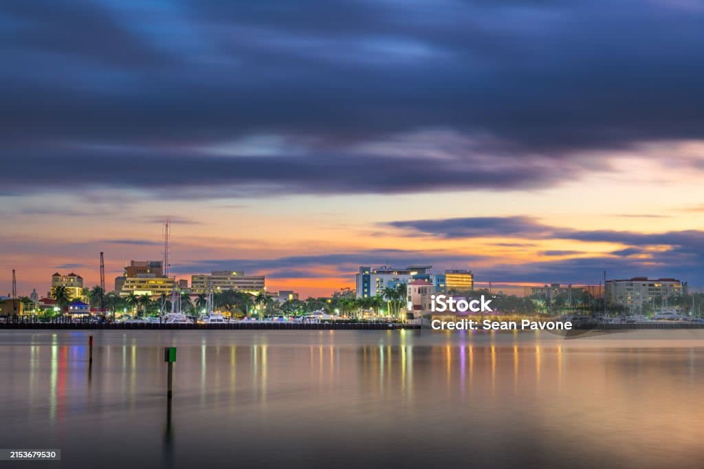 Bradenton, Florida, USA downtown cityscape on the Manatee River at dusk. Bradenton, Florida, USA downtown cityscape on the Manatee River at dusk.