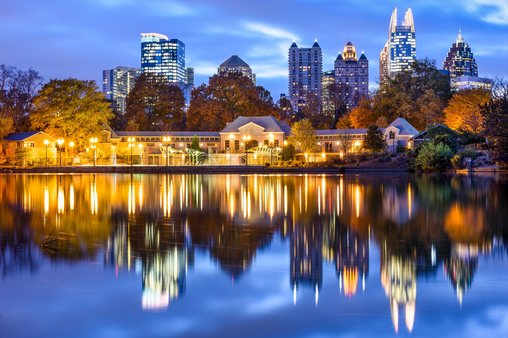Atlanta, Georiga Cityscape A lake reflecting lit-up Atlanta at dusk with the Downtown Atlanta skyline in the background