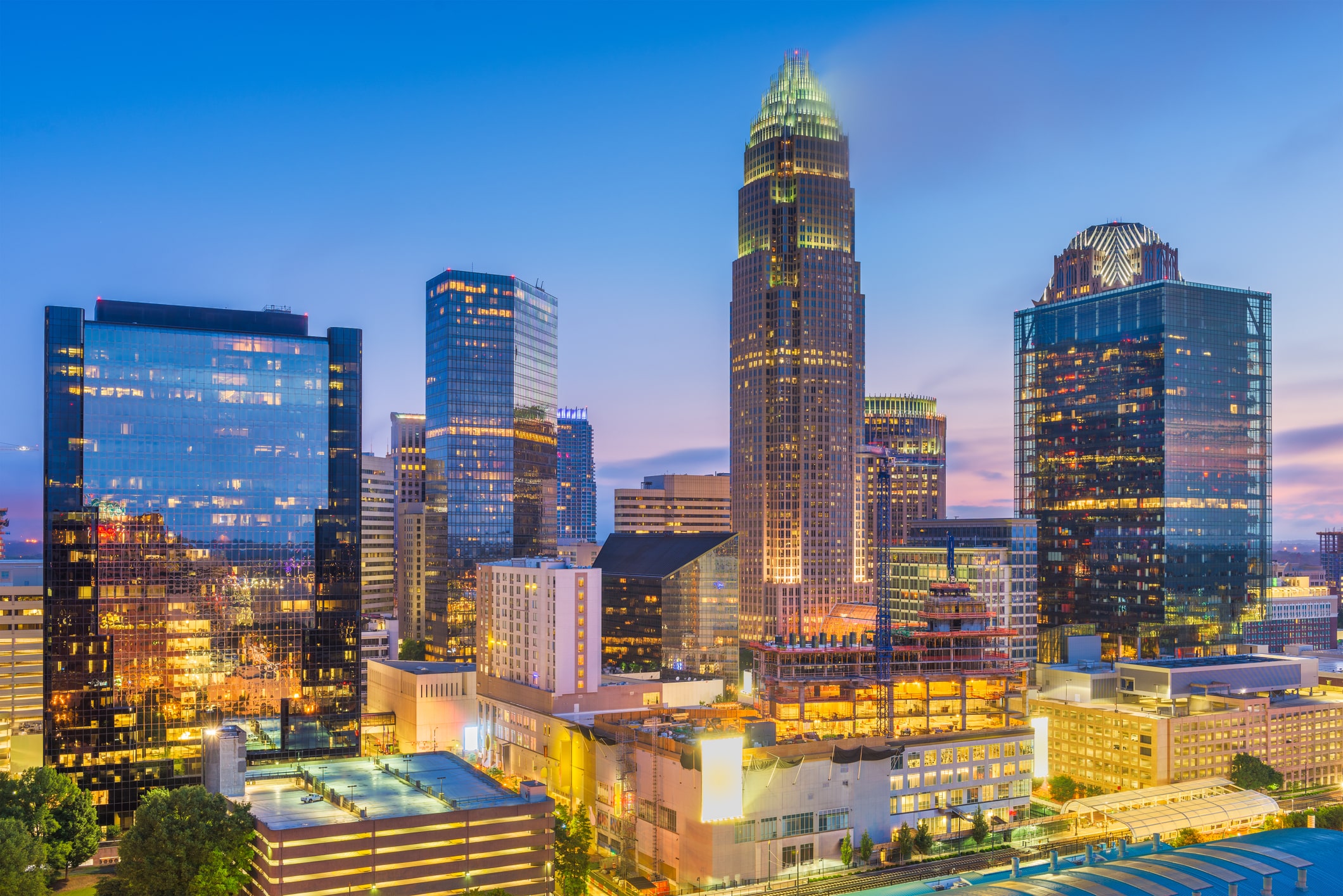 Charlotte, North Carolina, USA uptown skyline Beautiful downtown Charlotte shimmering with lights at night, a beautiful sight for those living in Charlotte, NC