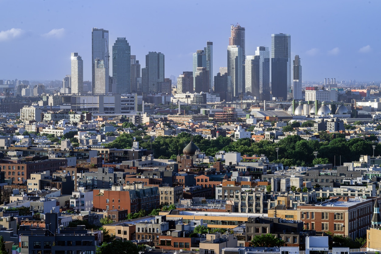 Cityscape of Queens, New York, with its diverse high-rise buildings and low-rise residential areas