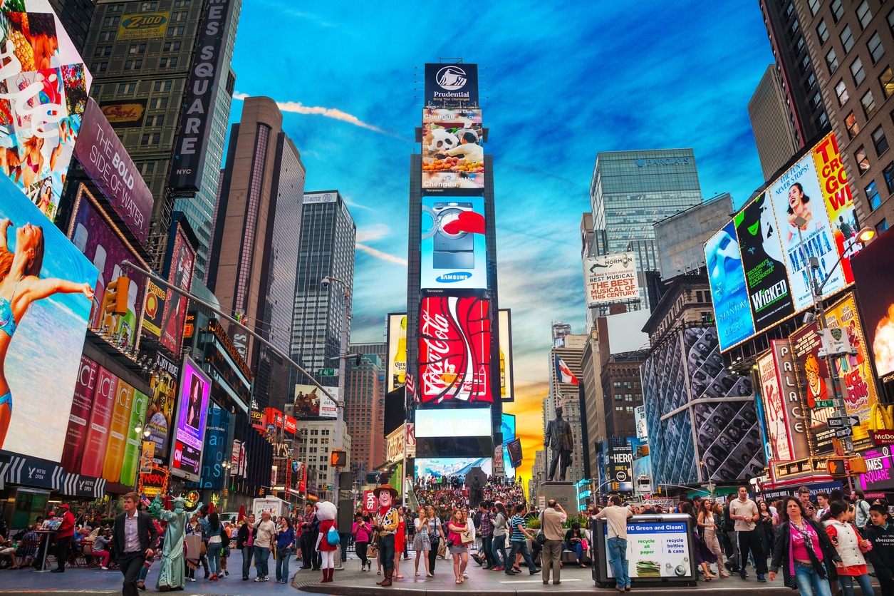 Times square in New York City Vibrant and energetic Times Square awaiting those moving from LA to NY, featuring bright lights and bustling crowds