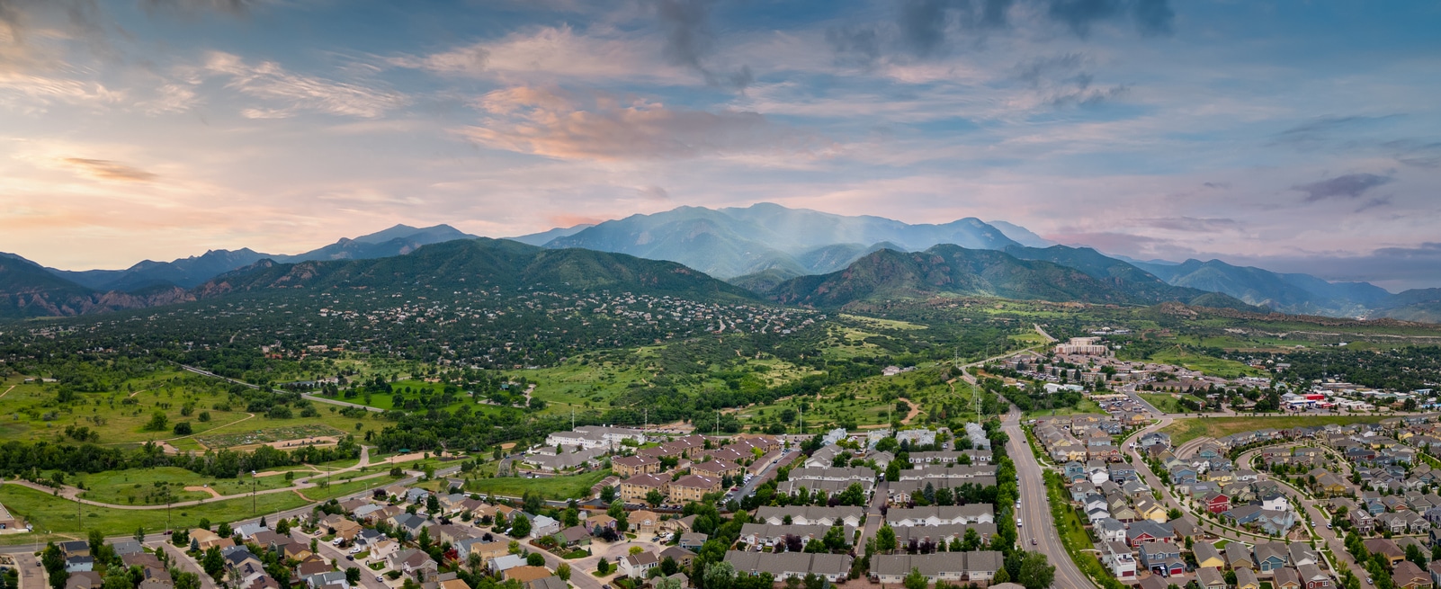 Panorama depicting suburban neighborhoods in Colorado Springs, with the Rocky Mountains in the background