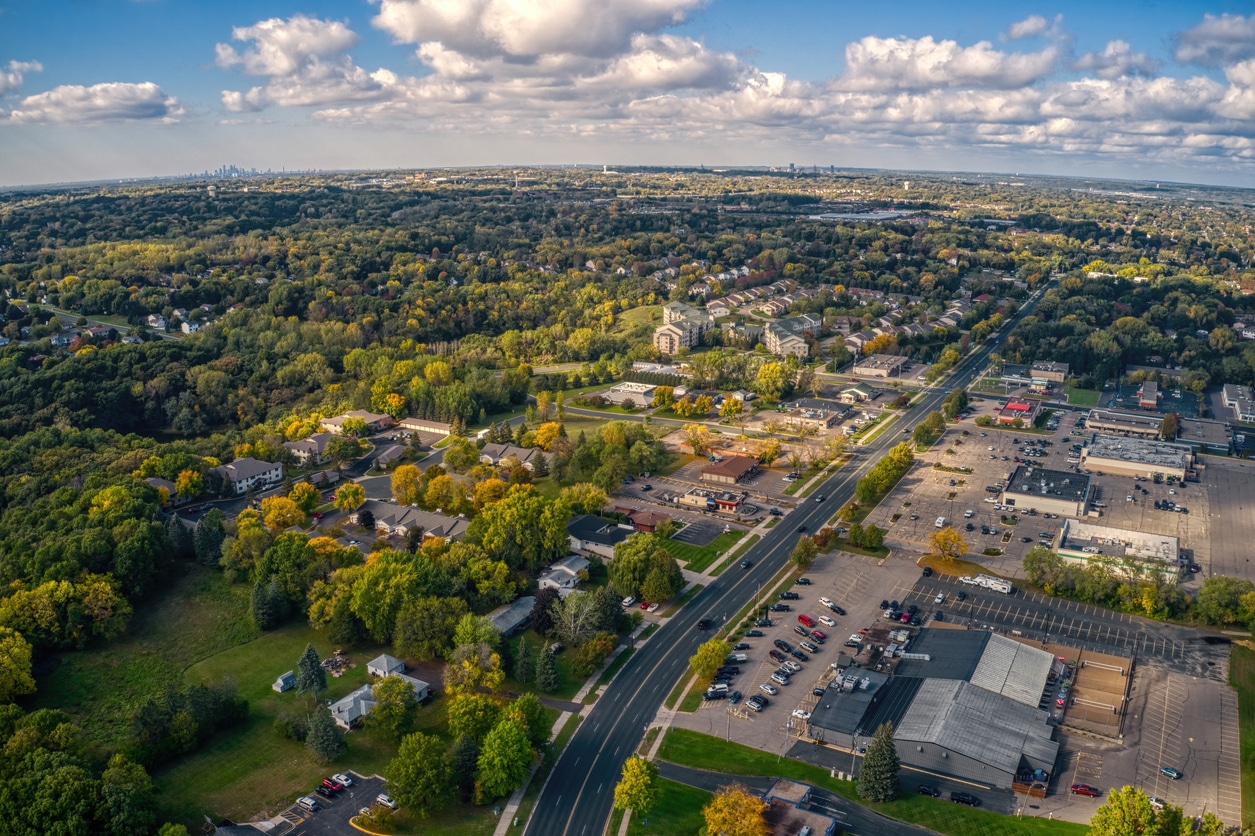 Aerial view of the Twin Cities Suburb of Inner Grove Heights in Minnesota Aerial view of Maple Grove, Minnesota, an ideal spot for those moving to the Midwest nestled among trees and next to a lake