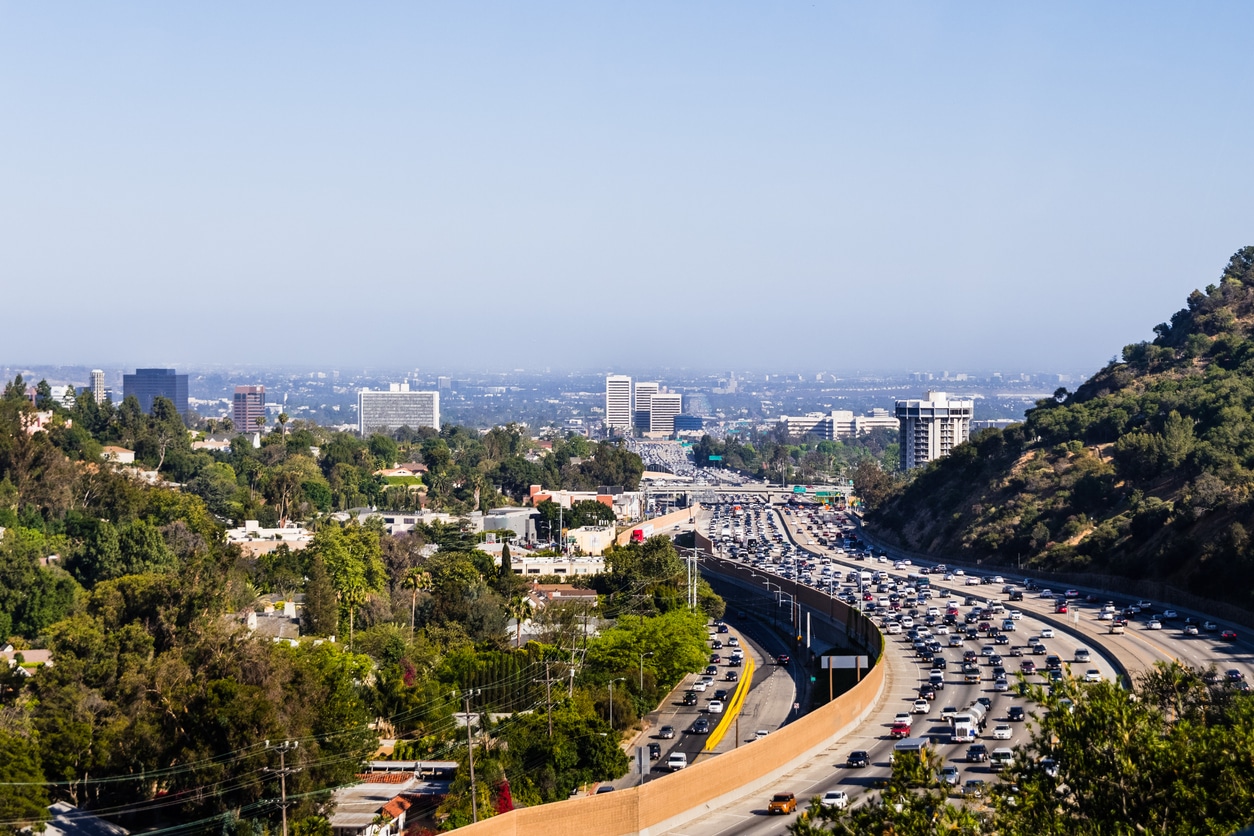 View toward West Los Angeles on a hazy day; heavy traffic on highway 405; California LA freeway traffic, which can take some getting used to for those moving from Phoenix to Los Angeles