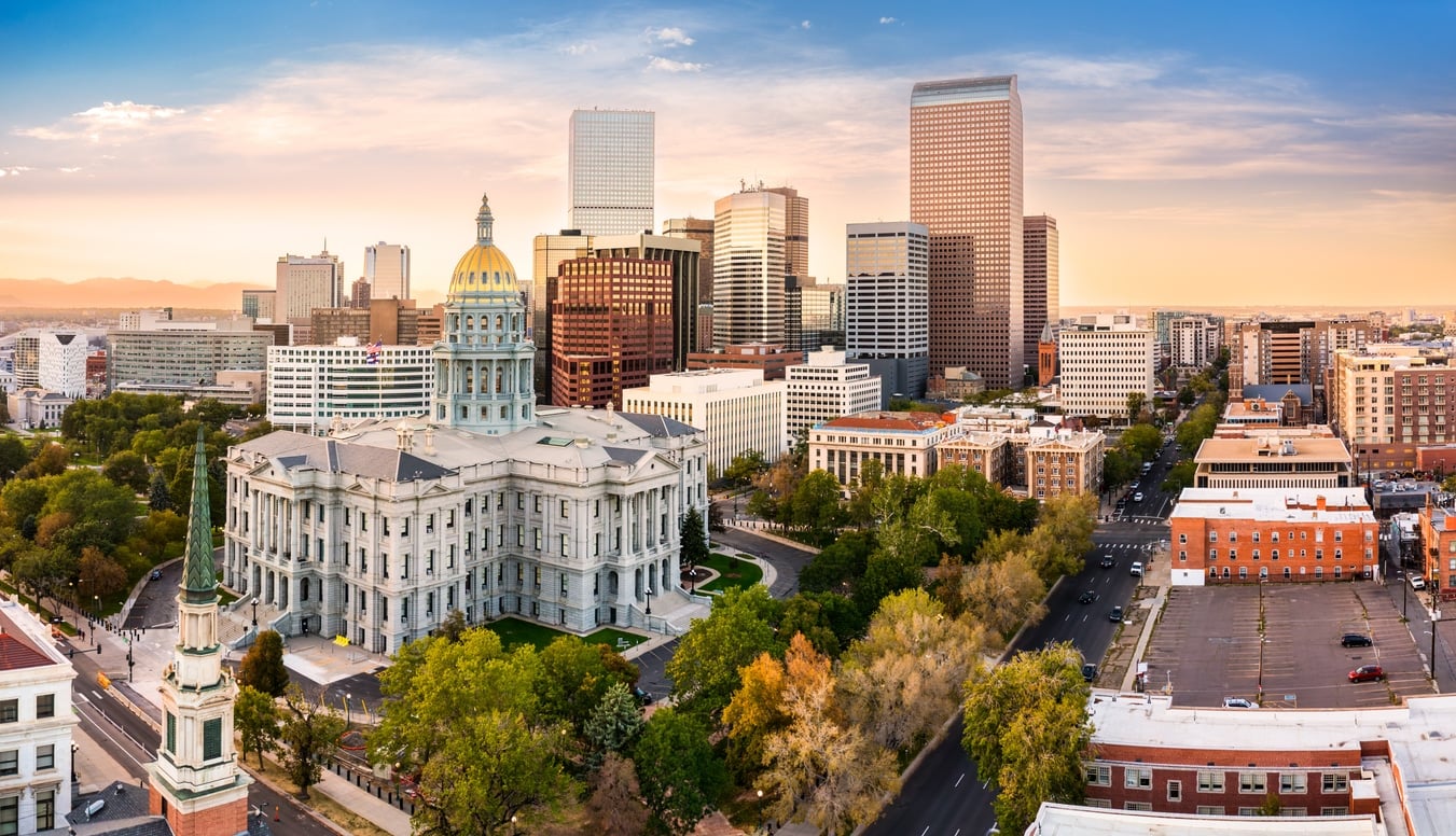  Sunset aerial view of Denver, Colorado, one of the best cities for tech jobs, featuring the golden-domed State Capitol