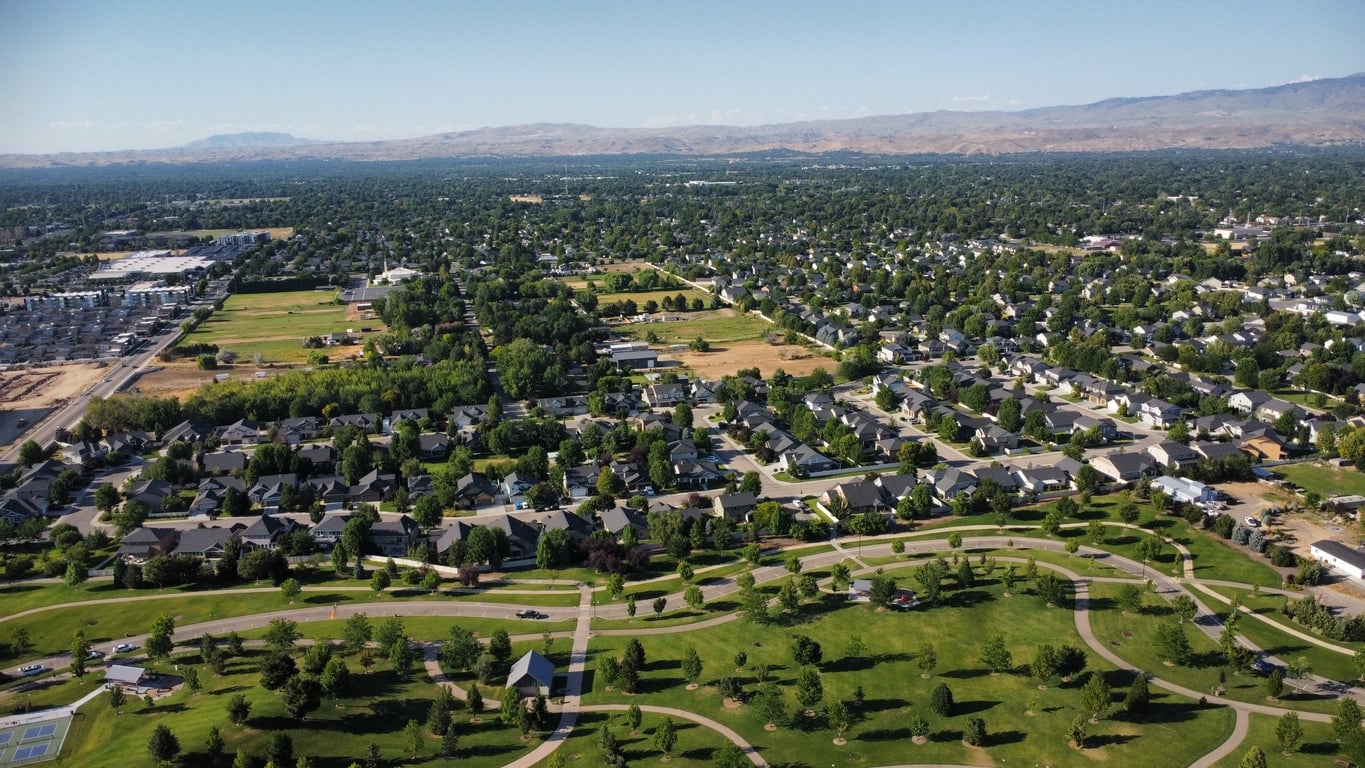 An aerial view of a lush, green residential neighborhood awaiting those moving to Boise, Idaho